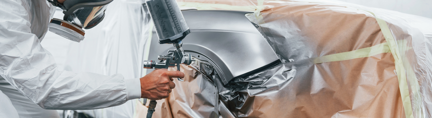 Auto Body and Collision Repair in Clio MI | Auto body repair technician restoring vehicle damage at Simms Body Shop Simms Body Shop collision repair facility in Clio MI